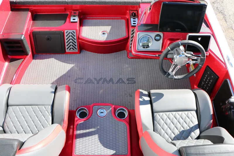 Slide: The Image of 2025 Caymas CX 20 PRO boat interior with red accents and modern dashboard. - 22