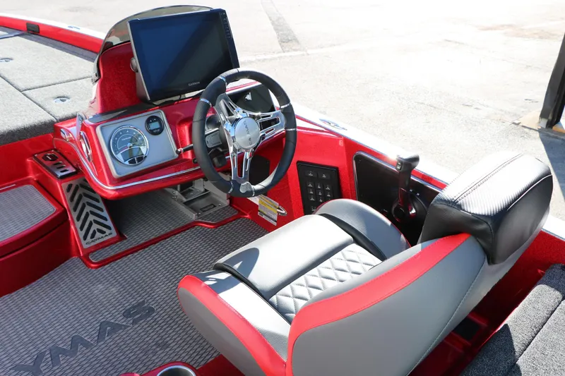 Slide: The Image of 2025 Caymas CX 20 PRO boat interior with steering wheel and dashboard display. - 23