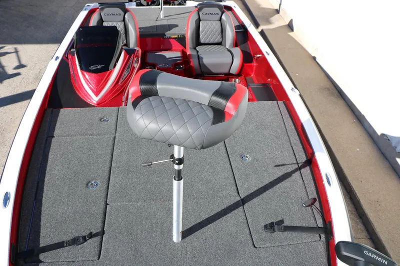 Slide: The Image of 2025 Caymas CX 20 PRO boat interior with gray and red seating, spacious deck. - 27