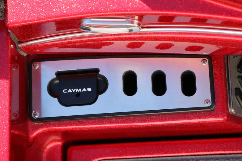 Slide: The Image of Red 2025 Caymas CX 20 PRO boat detail with logo and metallic accents. - 35