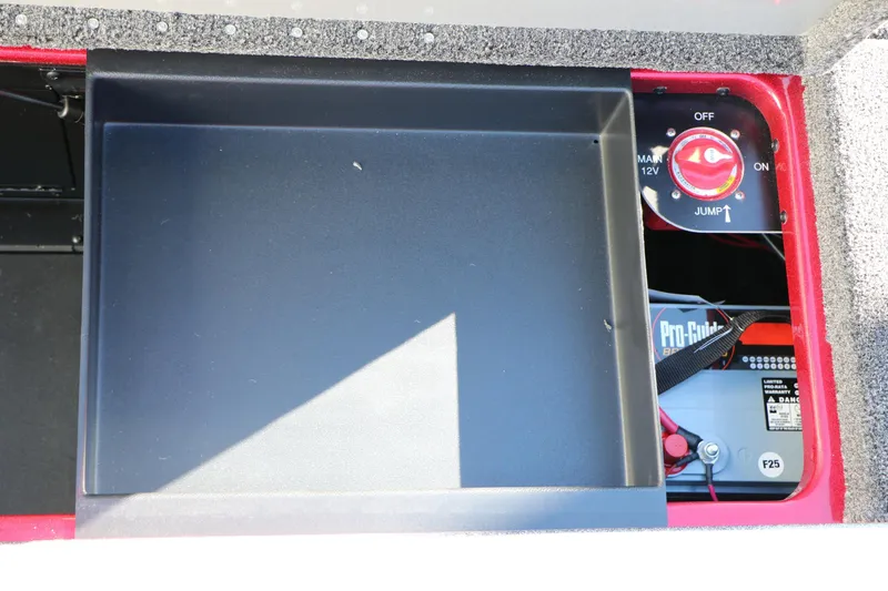 Slide: The Image of 2025 Caymas CX 20 PRO battery compartment with switch and Pro-Guide battery. - 38