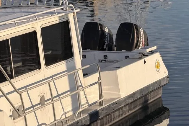 Slide: The Image of 2007 ACB Sportfisher boat with cabin entrance and life preserver on deck. - 3