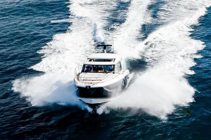 The Image of Manufacturer Provided Image: 2023 Prestige 420 S yacht cruising on open water. - 0