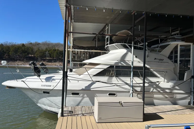 Slide: The Image of 2000 Cruisers Yachts 3750 Motoryacht docked on a sunny day. - 1