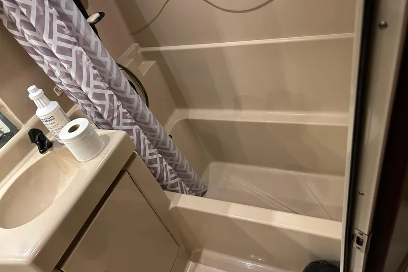 Slide: The Image of Bathroom interior of 2000 Cruisers Yachts 3750 Motoryacht with sink and shower. - 14