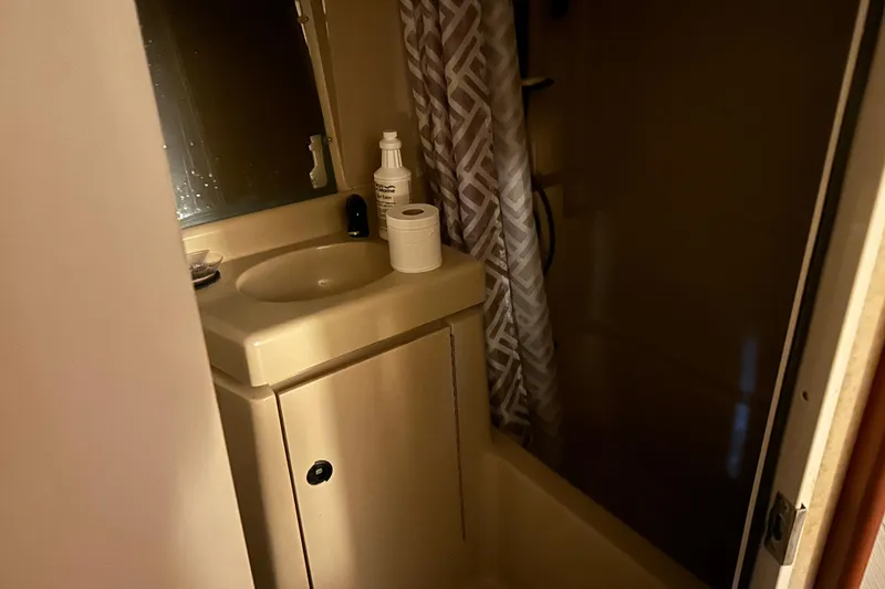 Slide: The Image of Bathroom interior of 2000 Cruisers Yachts 3750 Motoryacht with sink and shower. - 17