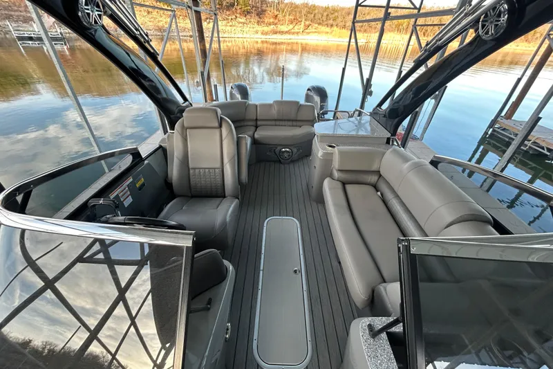 Slide: The Image of Luxurious 2020 Avalon 2785 Excaliber pontoon boat interior with plush seating and sleek design. - 11