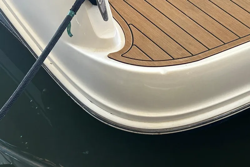 Slide: The Image of Close-up of 2005 Sea Ray 44 Sedan Bridge boat deck and railing. - 23