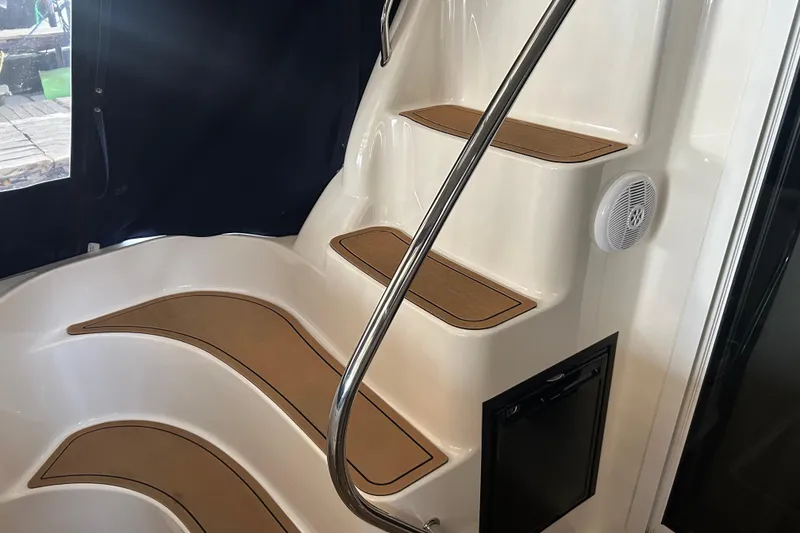 Slide: The Image of Staircase on 2005 Sea Ray 44 Sedan Bridge yacht with sleek design and handrail. - 27