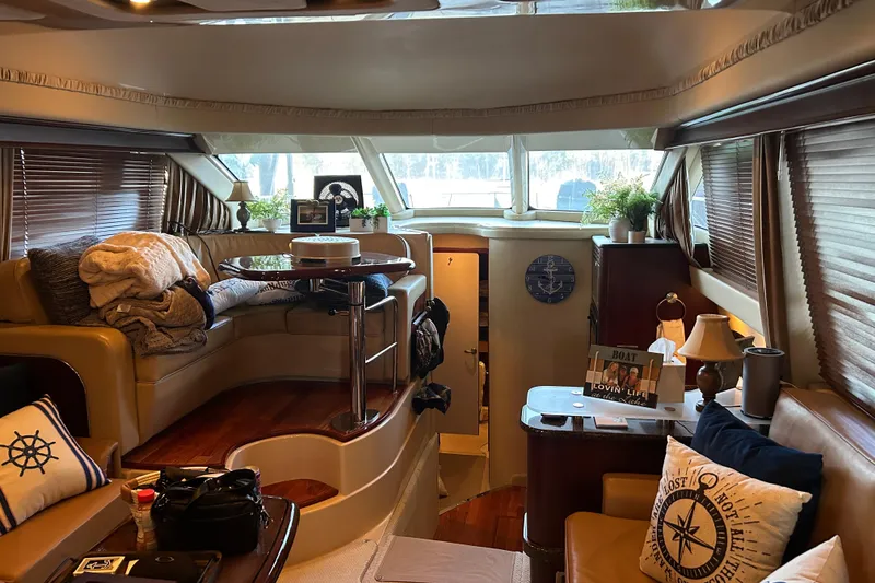 Slide: The Image of Luxurious interior of a 2005 Sea Ray 44 Sedan Bridge yacht with cozy seating. - 40