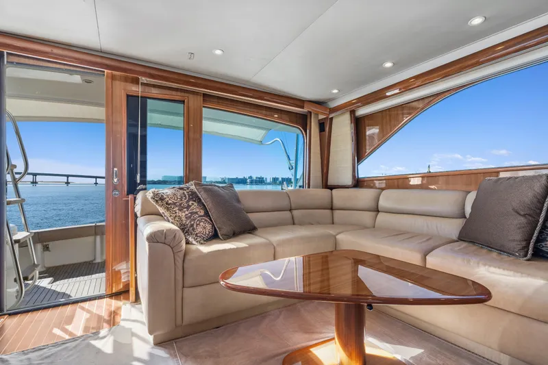 Slide: The Image of Luxurious interior of 2007 Viking 56 Convertible yacht with plush seating and ocean view. - 11