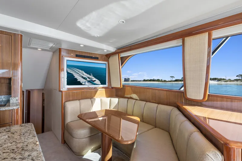 Slide: The Image of Luxurious interior of 2007 Viking 56 Convertible yacht with scenic ocean view. - 14