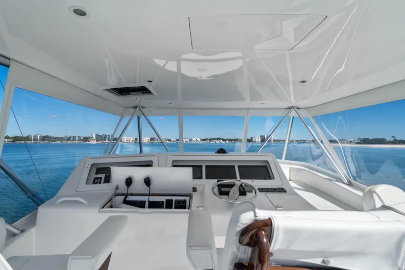 Slide: The Image of 2007 Viking 56 Convertible yacht helm with panoramic ocean view. - 47