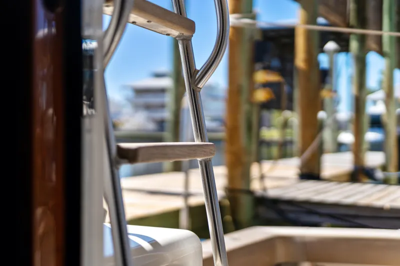 Slide: The Image of Ladder on 2007 Viking 56 Convertible yacht docked at marina. - 53