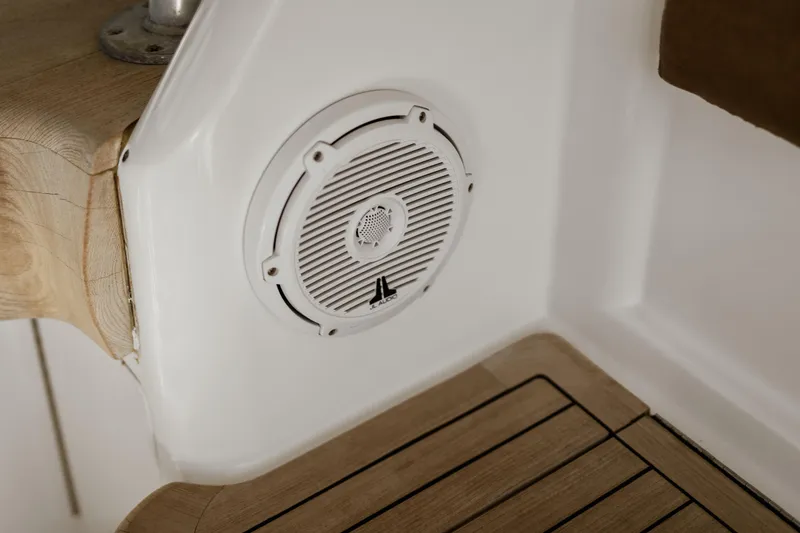 Slide: The Image of Speaker on 2007 Viking 56 Convertible yacht with wooden and white interior. - 55