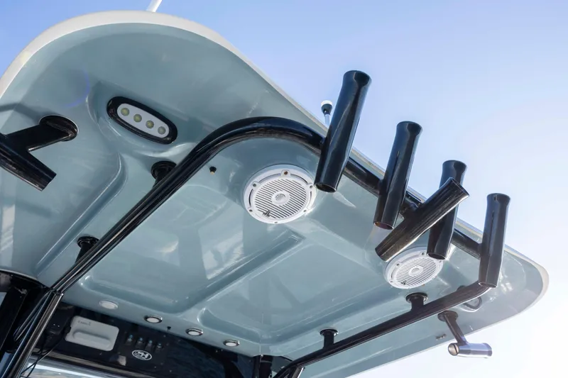 Slide: The Image of 2021 Sea Hunt Ultra 265 SE boat roof with rod holders and speakers. - 17