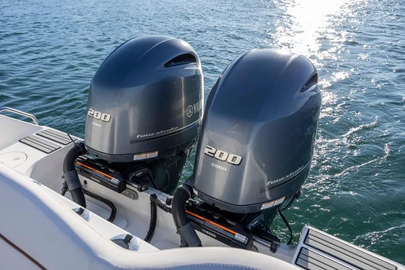 Slide: The Image of Twin Yamaha 200 outboard engines on 2021 Sea Hunt Ultra 265 SE boat. - 23