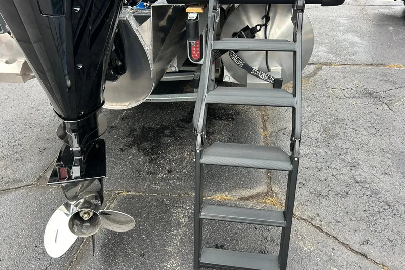 Slide: The Image of Boat ladder and propeller of 2026 Viaggio Lago Z-Q on pavement. - 11