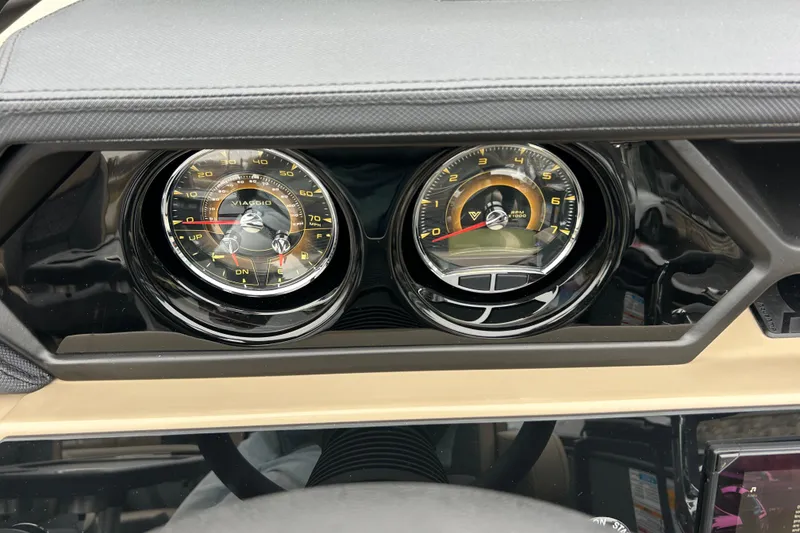 Slide: The Image of Dashboard of 2026 Viaggio Lago Z-Q with dual analog gauges. - 20