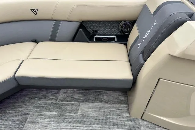 Slide: The Image of Luxurious seating in 2026 Viaggio Lago Z-Q boat with beige and gray upholstery. - 22