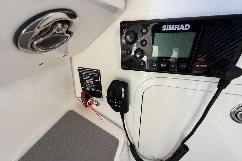 Slide: The Image of Control panel of 2022 Sea Ray Sundancer 320 Outboard with Simrad marine electronics. - 29
