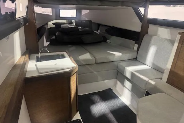 Slide: The Image of Interior of 2019 Axopar 37 XC Cross Cabin with seating and compact sink. - 10