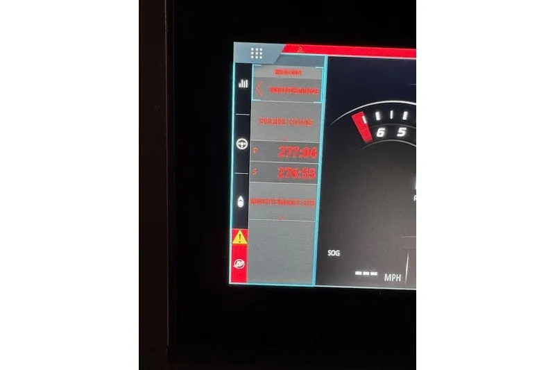 Slide: The Image of Display screen of 2019 Axopar 37 XC Cross Cabin showing engine hours and maintenance alerts. - 14