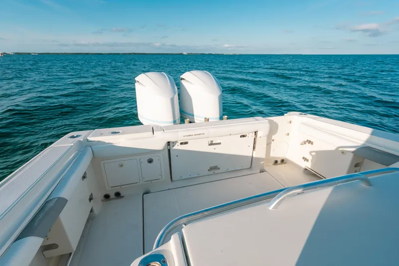 Slide: The Image of 2005 Hydra-Sports 3300 CC boat with dual engines on open water. - 20