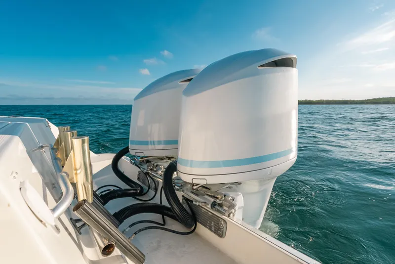 Slide: The Image of 2005 Hydra-Sports 3300 CC boat engines on open water. - 21