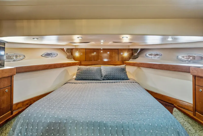 Slide: The Image of Luxurious cabin interior of 2007 Meridian 490 Pilothouse yacht with cozy bedding. - 25
