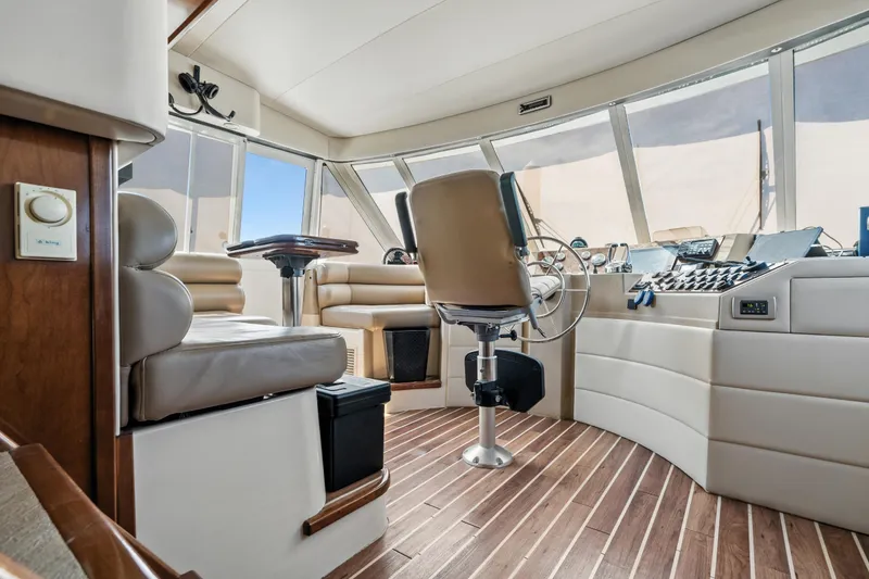 Slide: The Image of Luxurious 2007 Meridian 490 Pilothouse interior with modern helm and seating. - 38