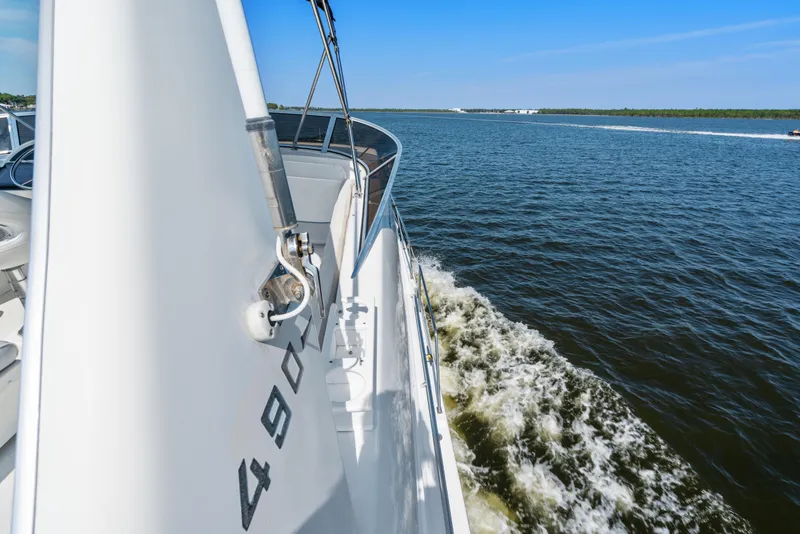 Slide: The Image of 2007 Meridian 490 Pilothouse cruising on open water, side view. - 63