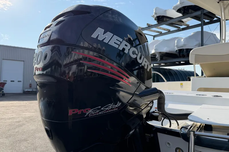 Slide: The Image of Mercury 200 Pro outboard engine on a 2017 Boston Whaler 210 Dauntless boat. - 21