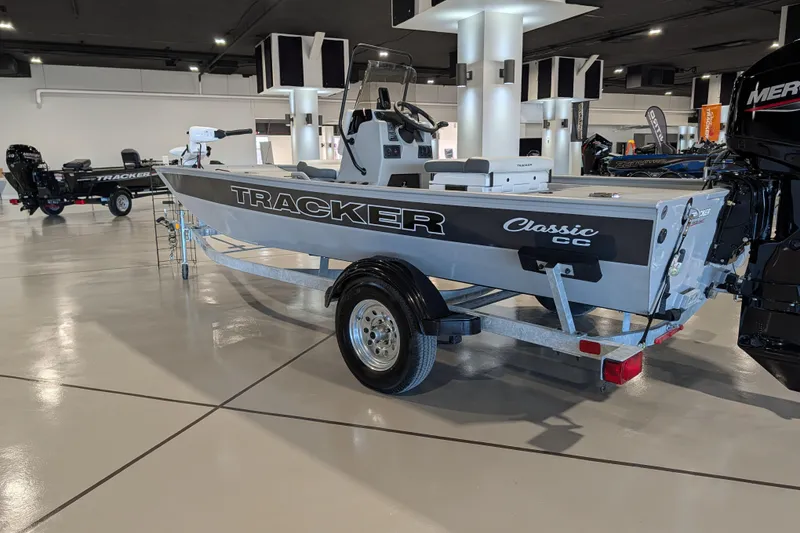 Slide: The Image of 2026 Tracker Bass Tracker Classic CC boat on display in showroom. - 49