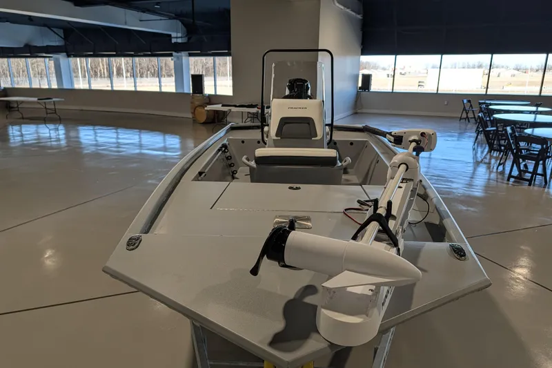 Slide: The Image of 2026 Tracker Bass Tracker Classic CC boat displayed indoors, featuring modern design and equipment. - 54