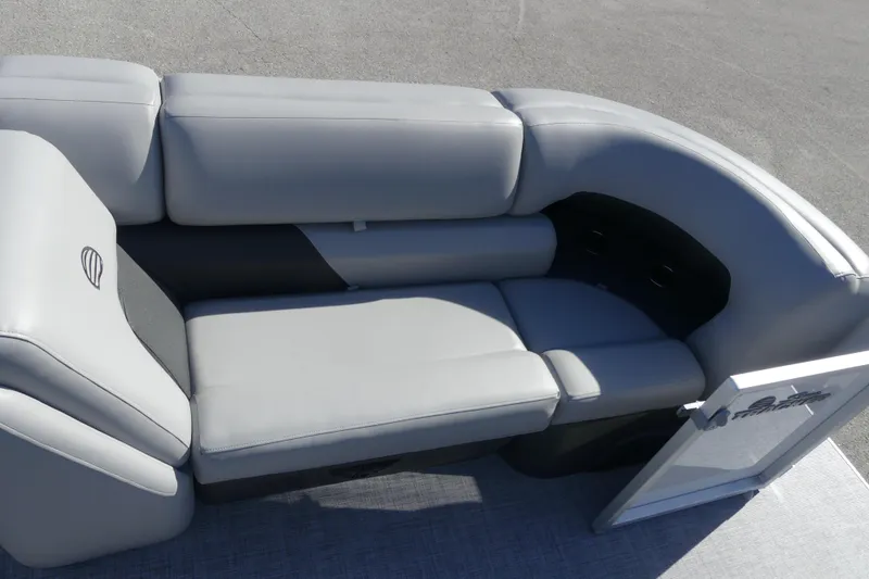 Slide: The Image of 2026 Sun Tracker Party Barge 20 DLX, featuring sleek gray seating and modern design. - 18