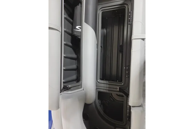 Slide: The Image of 2026 Sun Tracker Party Barge 20 DLX interior storage compartments, featuring sleek design and ample space. - 18