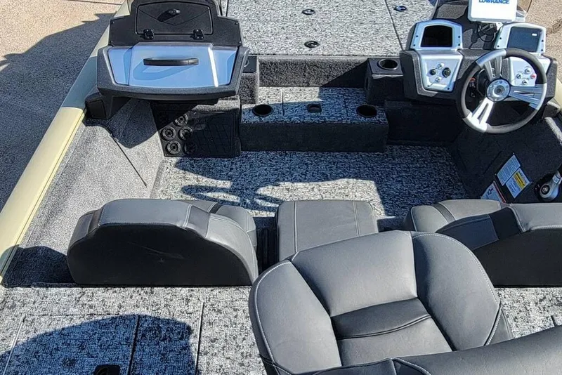 Slide: The Image of Interior view of 2026 Tracker Pro Team 195 boat with modern seating and controls. - 5