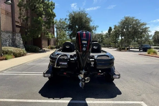 Slide: The Image of 2026 Nitro Z18 Pro boat parked in a sunny lot, rear view. - 4