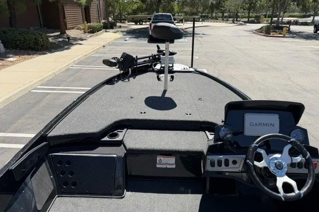 Slide: The Image of 2026 Nitro Z18 Pro boat interior with Garmin navigation system in a parking lot. - 7