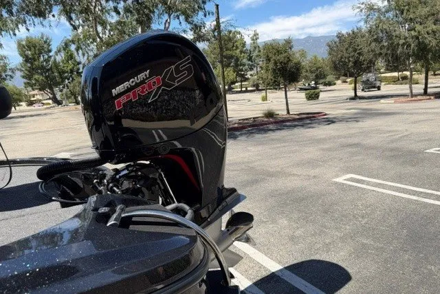 Slide: The Image of 2026 Nitro Z18 Pro with Mercury Pro XS engine in a sunny parking lot. - 5