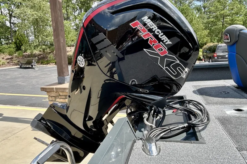Slide: The Image of 2026 Ranger VS1682SC Angler boat with Mercury Pro XS outboard motor in parking lot. - 3