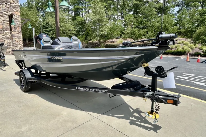 Slide: The Image of 2026 Ranger VS1682SC Angler boat on trailer, parked outdoors. - 2
