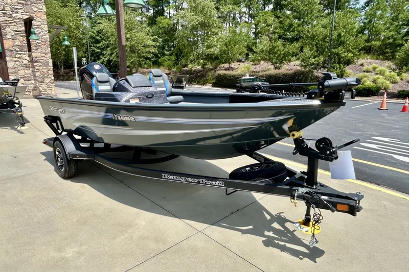 Slide: The Image of 2026 Ranger VS1682SC Angler boat on trailer, parked outdoors. - 8