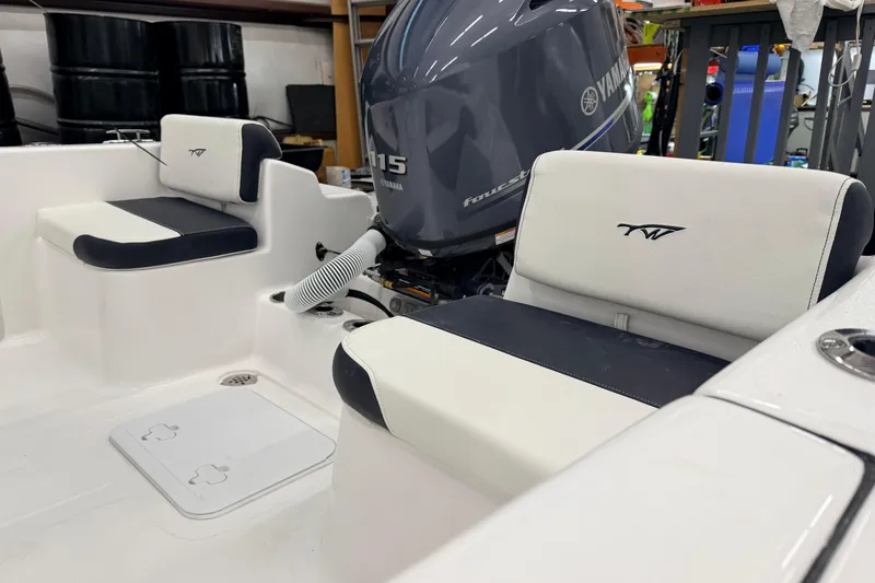 Slide: The Image of Steering console of 2026 Tidewater 180 CC Adventure boat with modern controls. - 13