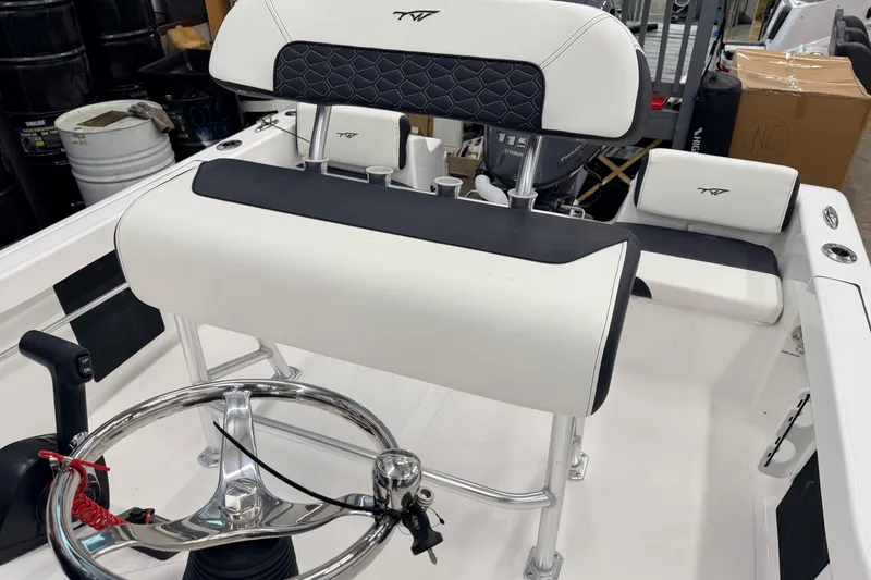 Slide: The Image of 2026 Tidewater 180 CC Adventure boat interior with Yamaha 115 engine and seating. - 8