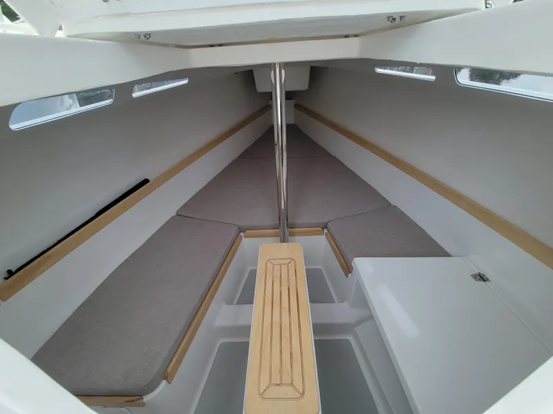Slide: The Image of 2024 Zonda Z24 Base Model boat interior with sleek design and comfortable seating. - 17