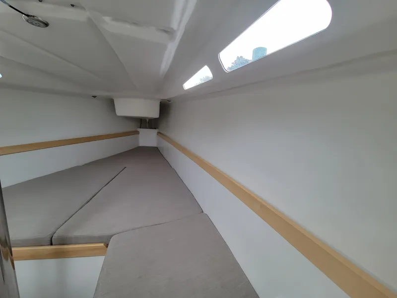 Slide: The Image of 2024 Zonda Z24 Base Model interior cabin with cushioned seating and sleek design. - 19