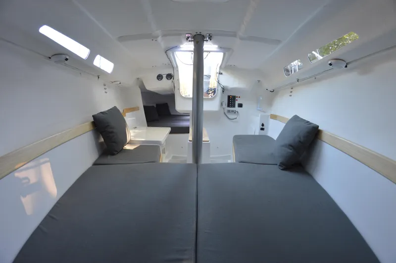 Slide: The Image of 2024 Zonda Z24 Base Model interior with modern seating and sleek design. - 25