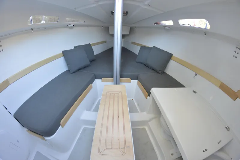 Slide: The Image of 2024 Zonda Z24 Base Model interior with gray cushions and sleek design. - 26